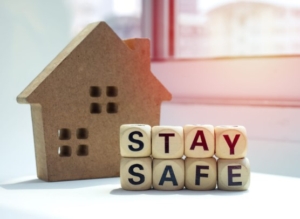 Wooden blocks spell 'STAY SAFE'