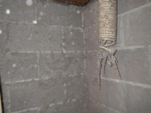 Minnesota Homeowners: 6 Costly Problems and Quick Fixes 4 a pipe in a corner of a room